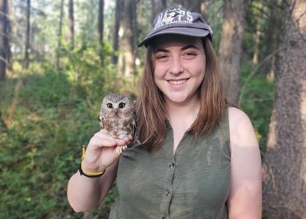 Tessa Rhinehart holding an Owl