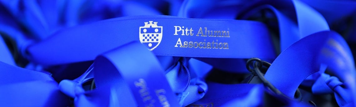 Pile of Pitt Alumni Association ribbons