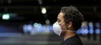 African American woman wearing covid mask African American woman wearing covid mask