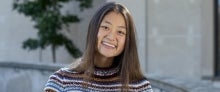 Smiling young woman outdoors