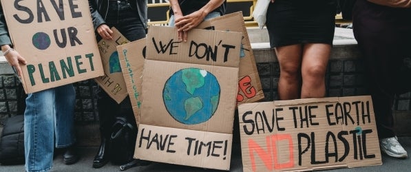 environmental activists and their signs environmental activists and their signs