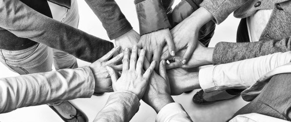 hands extended within a circle hands extended within a circle